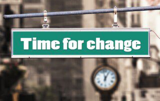 Time for Change sign post